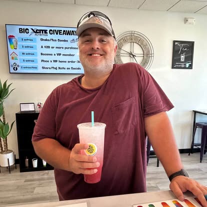 Customer enjoying an Xcite Nutrition shake or energy drink 7